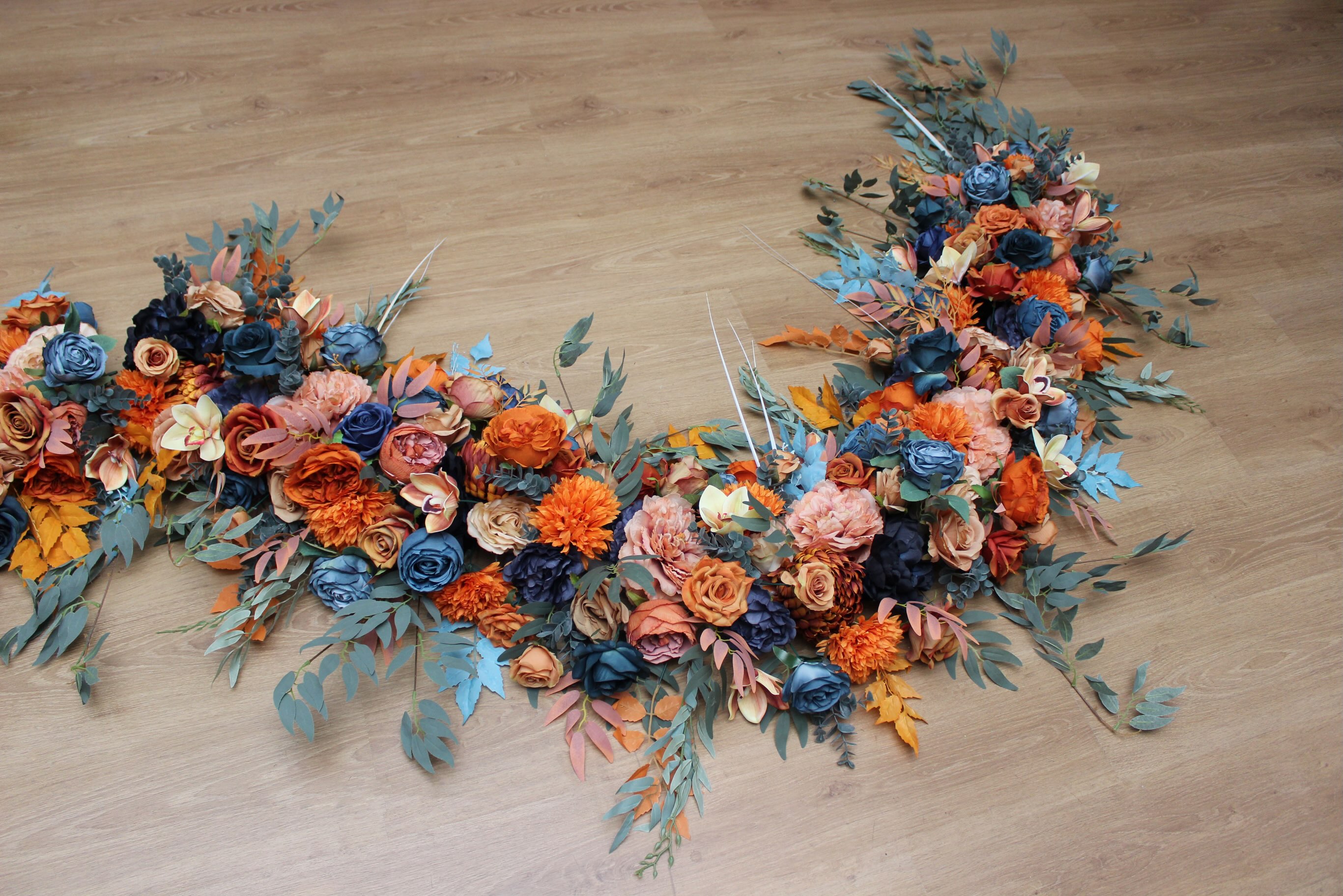 Stretching nearly 17 feet (5 meters) in length, this custom floral arch was designed to create a bold and unforgettable 